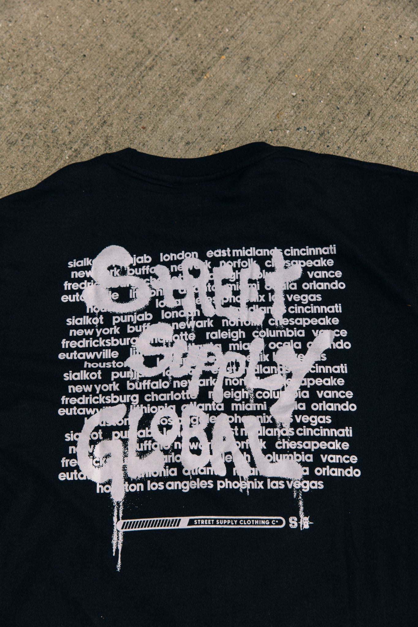 Global Spray Paint tees